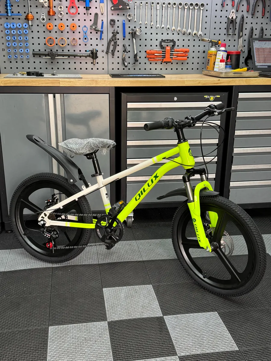 Bicicleta de Montaña Rodado 20 – 7 Cambios Shimano + Frenos de Disco – Gris